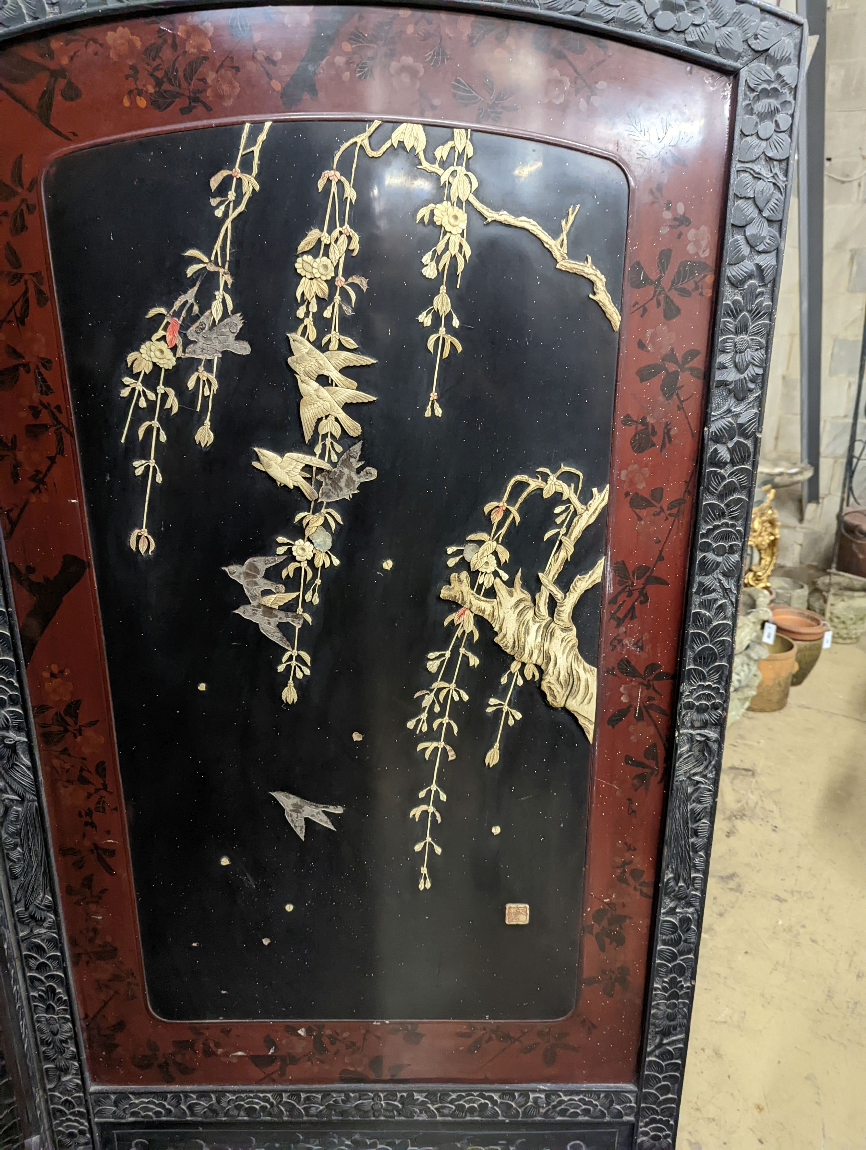 A Shibayama type lacquer bone mounted two fold dressing screen, each panel 84cm, height 182cm